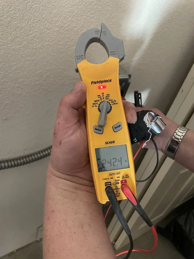 Voltage testing with clamp meter during Aluminum Wiring Replacement in Jacksboro